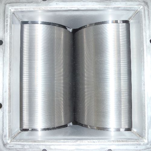 ロールグラニュレータ 耐摩耗材